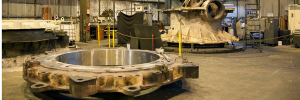 Marion Machine LLC machine shop interior with parts of extremely large crushers like Symons 7' Extra Heavy Duty